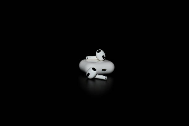 Close-up on checking serial numbers to ensure AirPods Pro are not counterfeit